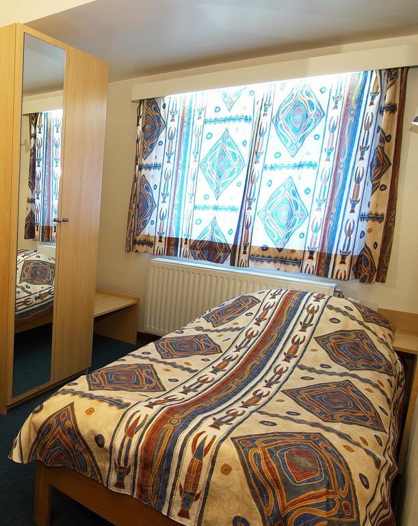 Hotel Apollo Zutendaal Quarto foto